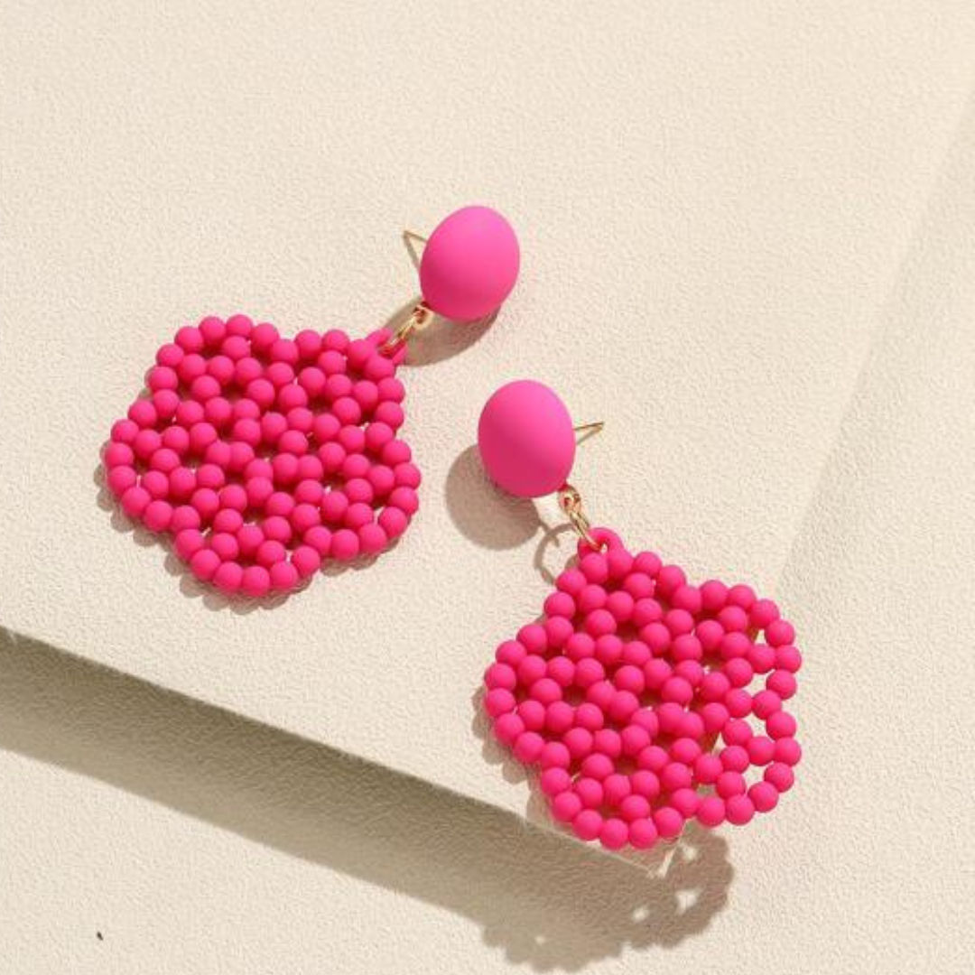 Pink beaded flower drop earring.