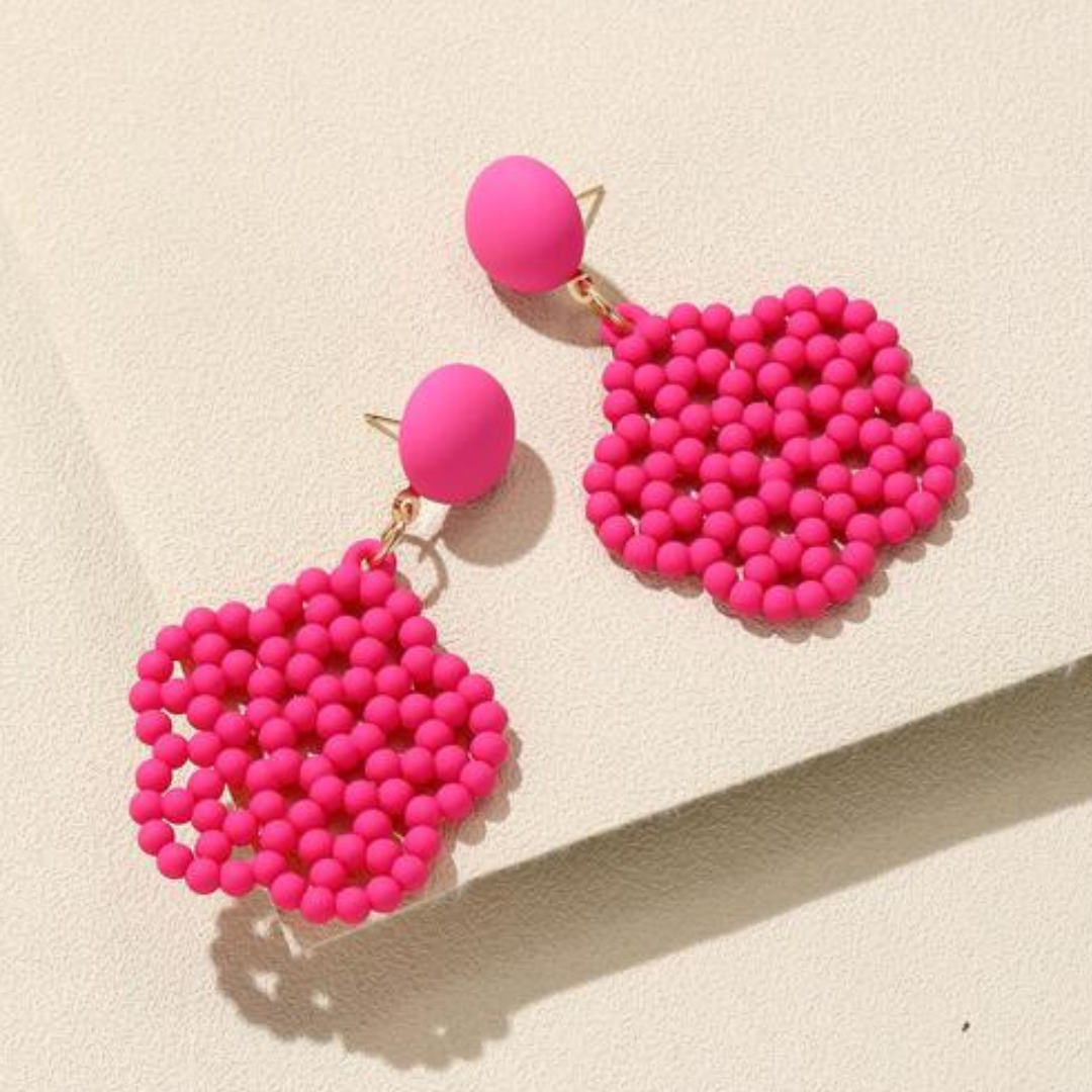 Pink beaded flower drop earring.