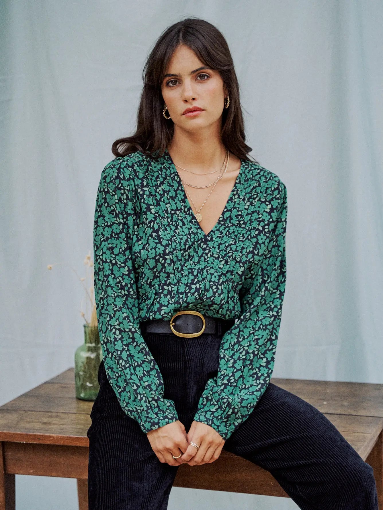 Green flower print long sleeve blouse from Garance Paris matched with velvet black pantse